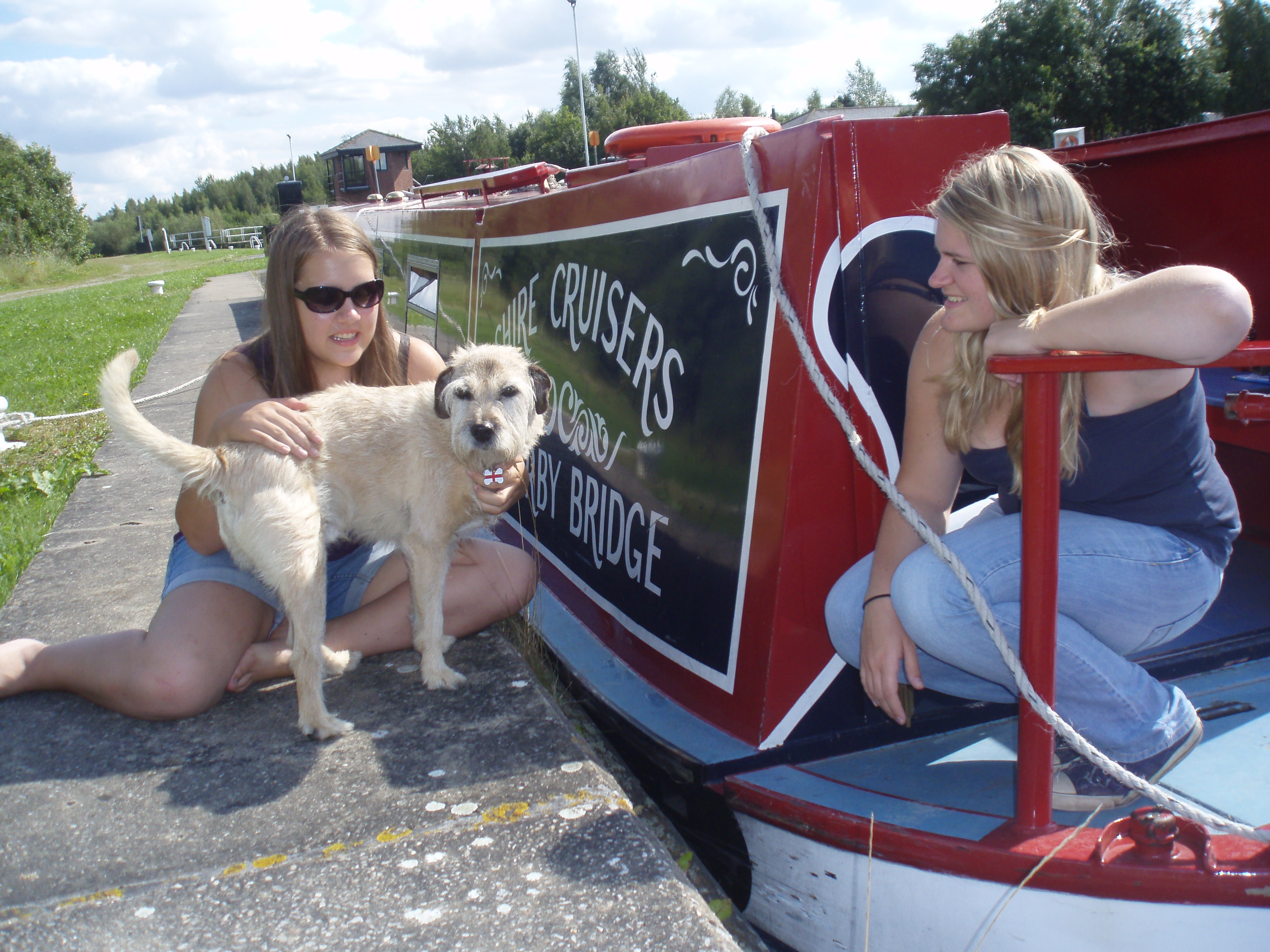 A visiting dog befriends our crew